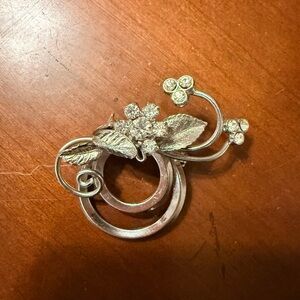 Elegant Silver Floral Brooch